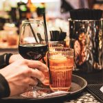Evening aperitivo with cocktails, capturing Positano's nightlife atmosphere