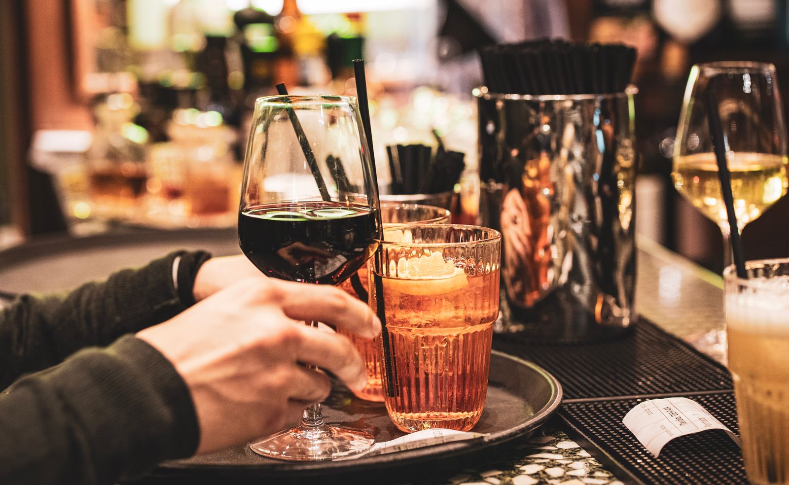 Evening aperitivo with cocktails, capturing Positano's nightlife atmosphere